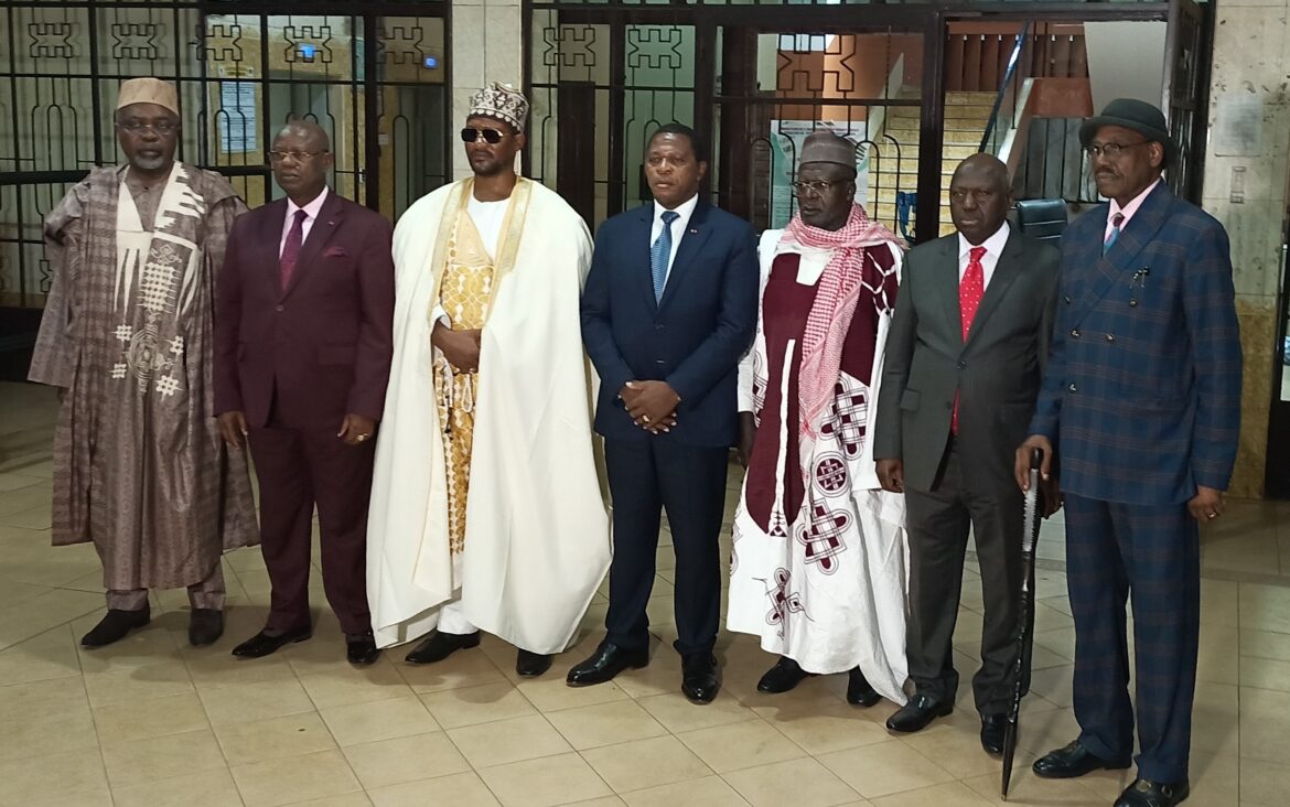Minister Atanga Nji poses for a family picture with the traditional of Bamoun and Tikar
