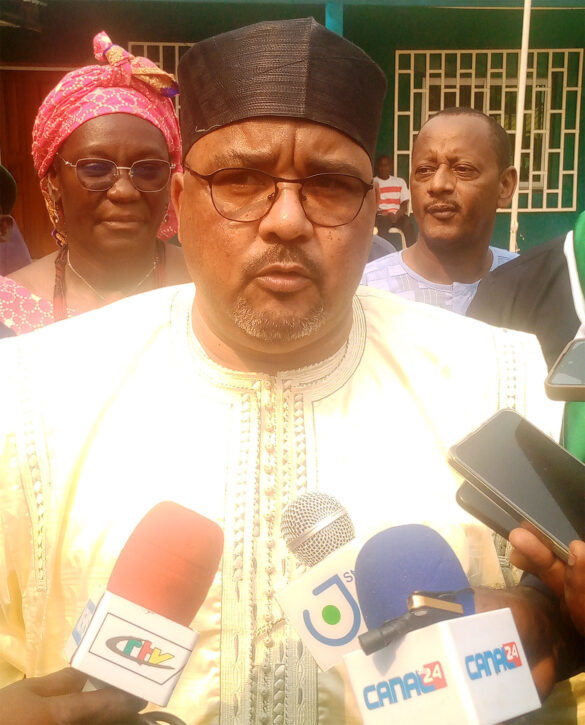 Osih talking to reporters on sidelines of the NEC meeting