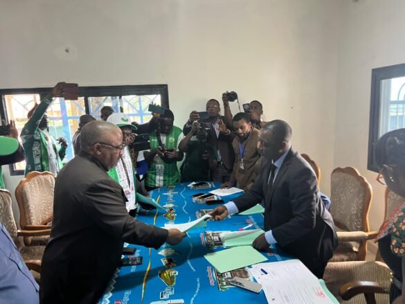 SDF Presidential Candidate, Hon Joshua Osih Nabangi, hands his File To NW ELECAM boss, Elvis Mbowoh