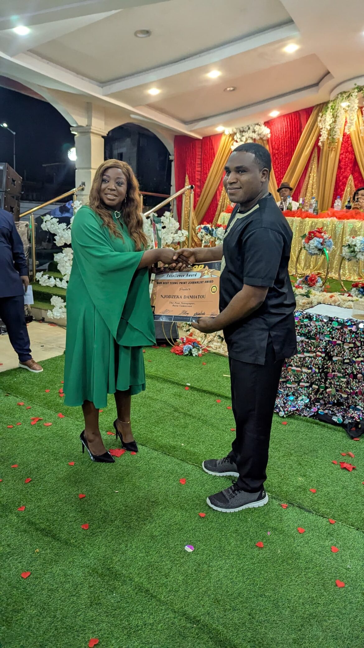 The post’s assistant desk editor, njodzeka kernyuy receiving award from meme’s divisional delegate for communication, slesor ebane