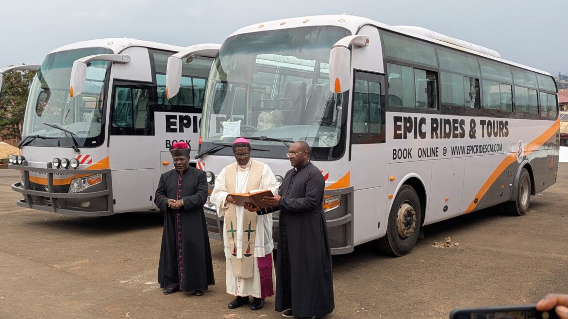 Archbishop shop Andrew Nkea (m) flanked by his collaborators as he reads the word of God at the inauguration of Epic Rides and Tours in Bamenda