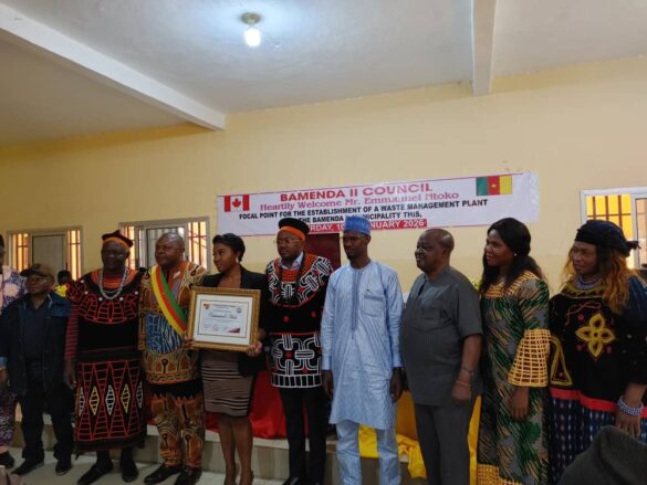Authorities and partners in a family photo after receiving the project on behalf of the municipality.