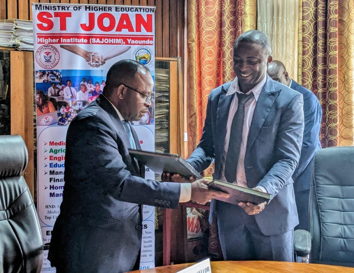 UB Vice Chancellor (Left) and St Joan President (right) exchange MoUs