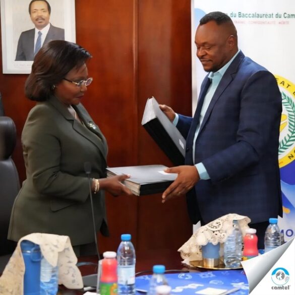 CAMTEL GM Judith Yaah Sunday and OBC Director exchanging MoU after penning down the agreement