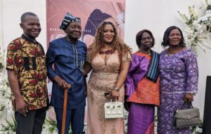 Elsie Nfor (center) flanked by parents and grandparents on both sides 