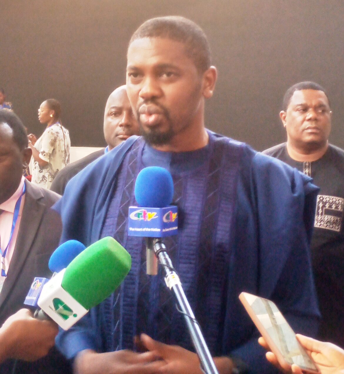 Dr. Zeh Meka talking to reporters