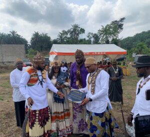 Sango Mafany Ngando receiving certificate after installation as Senior Notable of Monde