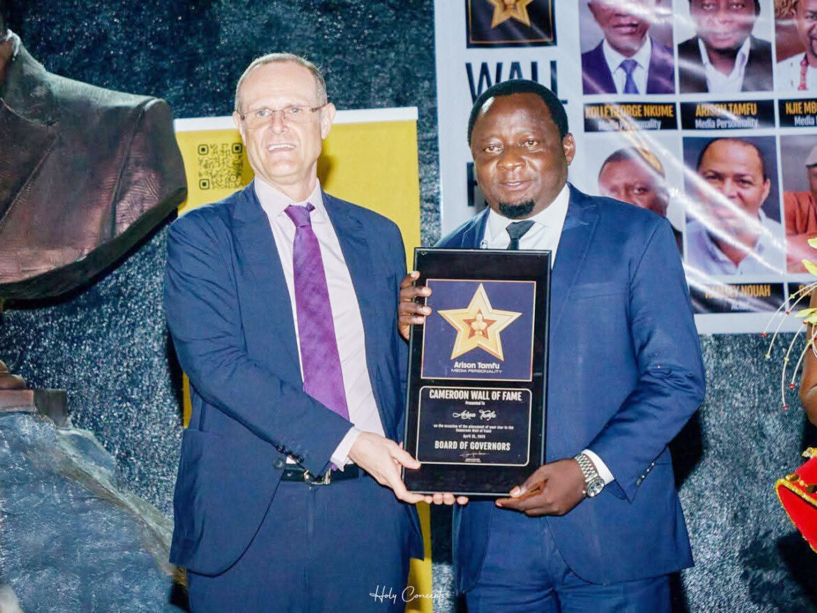 Arison tamfu receives induction award from chargé d'affaires at the american embassy in cameroon, john g