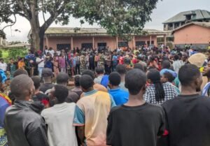 Cross section population gathered at horrific scene of Muea killings